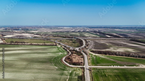 Aerial view of highway interchange in agricultural landscape