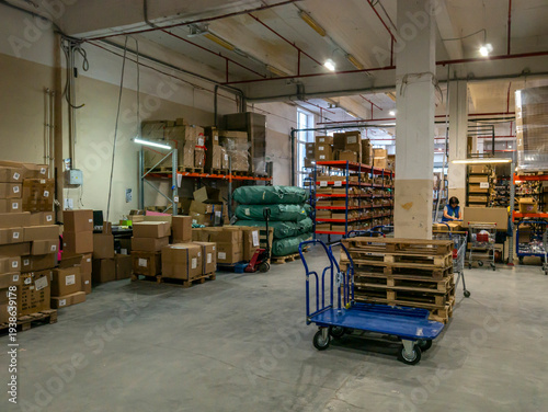 Voronezh, Russia, December 24, 2025: A huge warehouse with boxes and pallets, industrial logistics