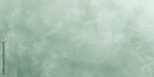 A light grunge wall texture with green and white space background features a smoky fog pattern and stormy clouds. grungy look perfect for backgrounds or edgy design work.