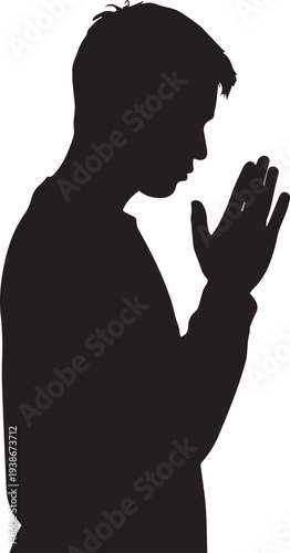 Silhouette Side View of a Young Man Praying with Hands Pressed Together