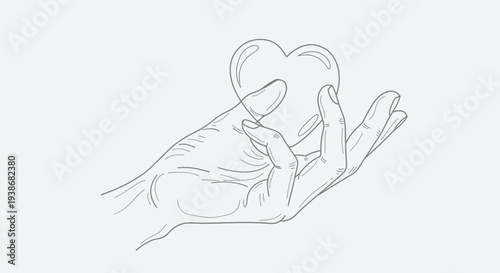 Hand holding a small heart shape.