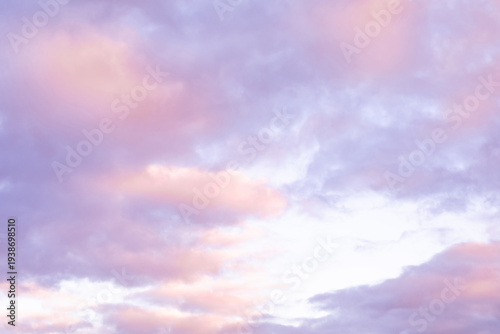 Dreamy Pink and Purple Sunset Sky with Soft Clouds