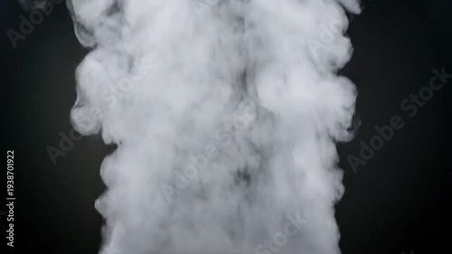 Dramatic plume of white smoke rising against a stark black background, creating a powerful visual effect