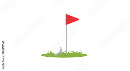 A red triangular golf flag stands in a green patch of grass with a hole, next to a white golf ball.