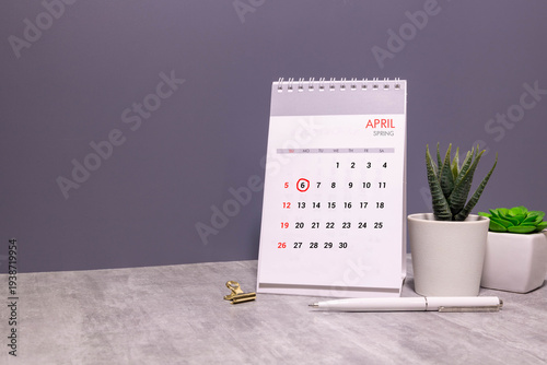 6 April on wooden grey cubes. Calendar cube date 06 April. Concept of date.