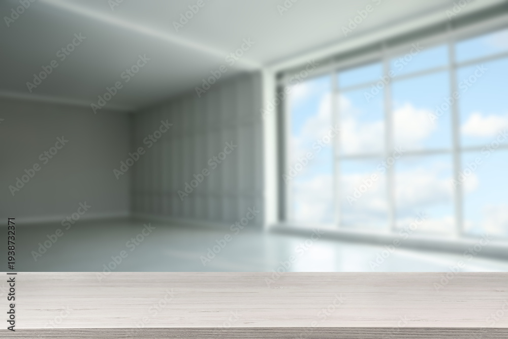 Obraz premium Empty wooden table in room, selective focus. Space for design