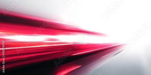 Intense motion blur creates streaks of brilliant crimson light against a bright background