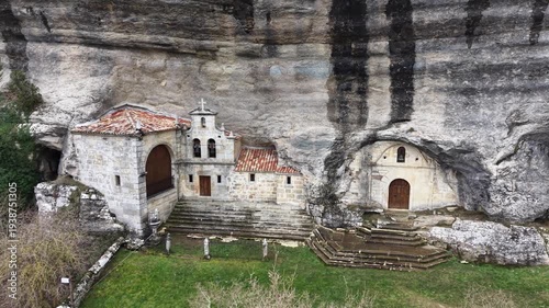 Ojo guareña hermitage built into rock cliff