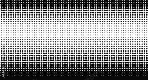 Gradual transition from black to white through small dots, creating a gradient effect from top to bottom, depicting a monochrome halftone pattern