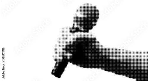 Voice in the Spotlight: A hand firmly grips a microphone, poised for the spoken word, creating an atmosphere of anticipation and communication.