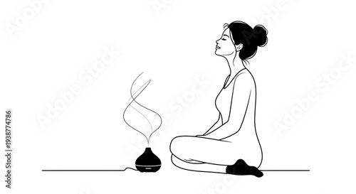 peaceful woman practicing mindfulness with an essential oil diffuser for relaxation