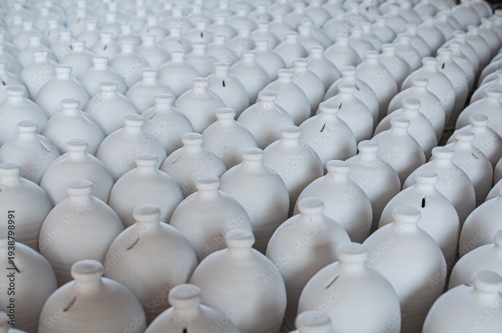 Fototapeta premium Bahrain’s traditional A’ali hand-crafted pottery. Clay pots drying.