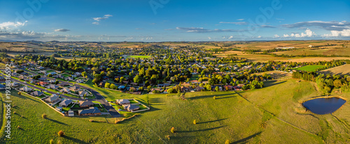 Golden hour light over the rural landscape with clouds