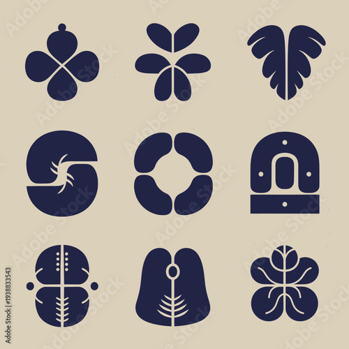 Collection of nine Japanese mon family crests and symbols.