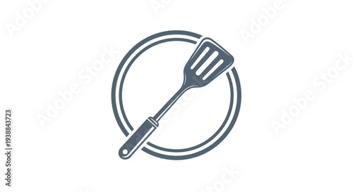 Simple Illustration of a Spatula on Plate.
