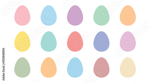 Flat lay of colorful Easter eggs on a white background with pastel hues and oval shapes.