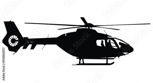 Photos Black silhouette of a helicopter in mid flight showcasing its rotor and fuselage