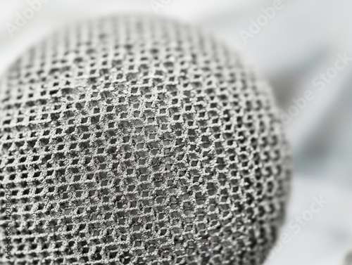 Additive manufacturing metal products created through 3D printing technology in industrial setting