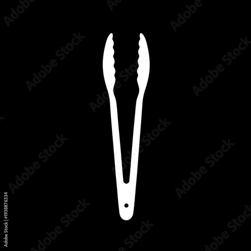 White Kitchen Tongs Isolated on Black.
