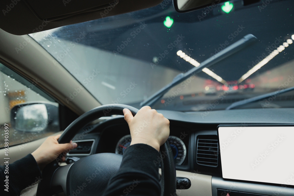 Fototapeta premium People driving car in tunnel