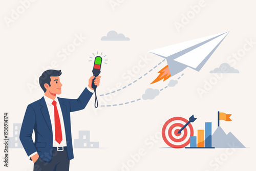 Businessman holding a remote to launch a rocket paper airplane towards a target and mountain peak, representing business strategy, leadership, project control, and achieving corporate success.