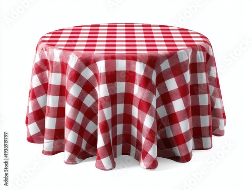 A round table covered with a red and white checkered cloth for festive occasions