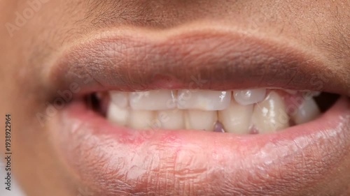 Close up view of man smiling showing white teeth and healthy gums for dental care concepts