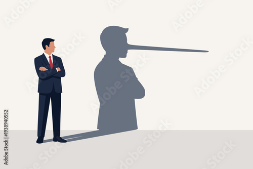 Businessman in a Suit Standing with a Long Nose Shadow Like Pinocchio Representing Dishonesty, Lying, Business Fraud, Lack of Integrity, Fake Information, Deception, and Corporate Cheating.