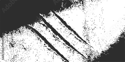 Abstract black and white grunge background featuring a dark ink splash texture with a splat paint border and vintage spray splatter design