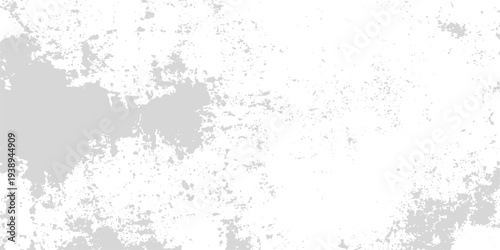 Abstract, faded texture shows a white background with a faded gray spots, offering an elegant aesthetic for backgrounds.