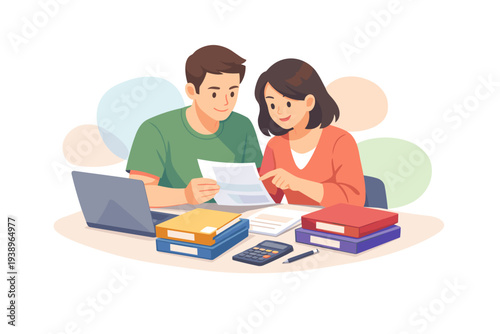 Couple reviewing documents and using laptop for finances.