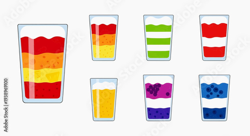 Colorful layered drinks in glasses on a table indoors