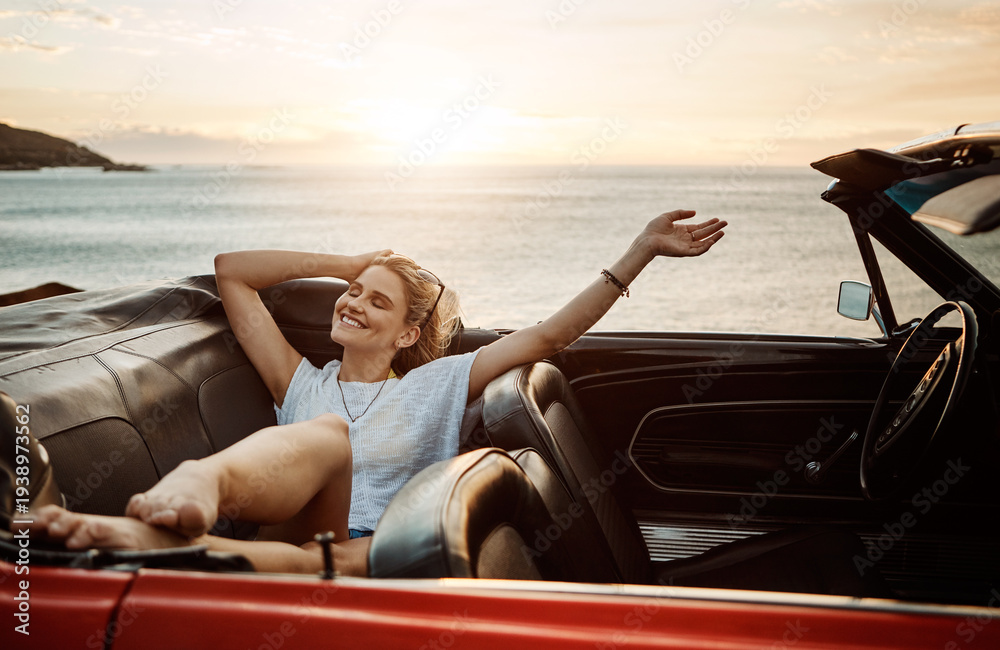 Obraz premium Road trip, rest or woman in car with beach sunset, outdoor destination or relax on tourist vacation. Travel, chilling or person at ocean with vehicle, weekend break or summer evening in Australia.