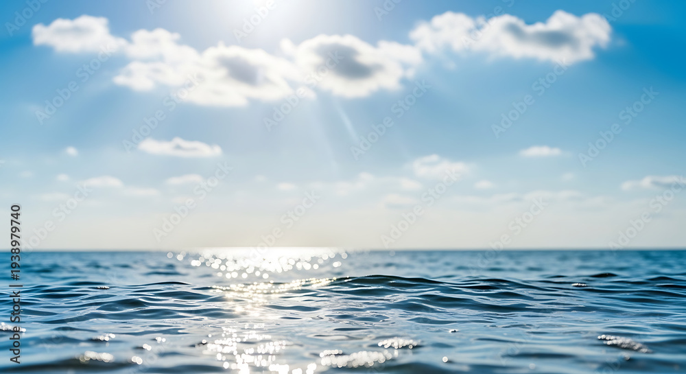 Obraz premium Abstract tropical summer nature landscape showcasing vibrant sun glare reflecting on shimmering sea water wave during golden hour with artistic close-up detail of ocean ripple