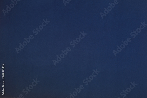 Dark blue wallpaper with grains texture