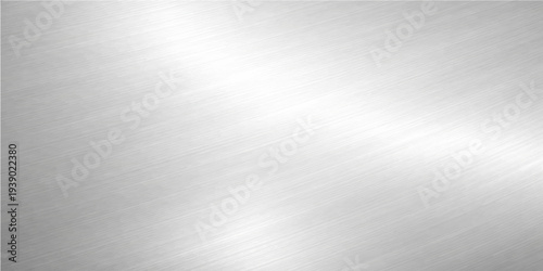 Abstract sleek and smooth, a monochrome expanse of polished metal, gleaming with a gentle play of light and shadow, suggests a sense of modernity and minimalist elegance.