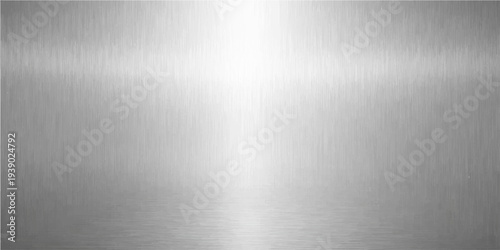 Abstract metallic surface showcases a polished and modern aesthetic with the play of light reflecting from the brushed texture.