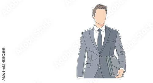 Businessman in Gray Suit Standing Confidently.