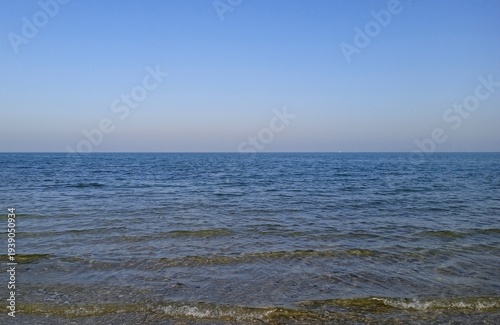 Beautiful sea landscape, blue sky and calm water of the sea