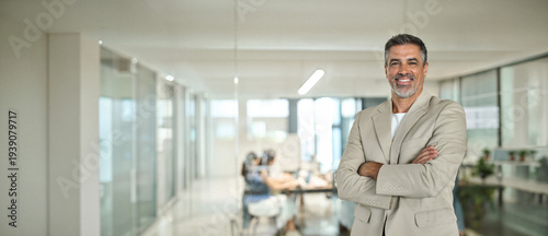 Fényképezés Portrait of confident happy rich middle aged business man investor, older team leader, mature professional company executive wearing suit standing arms crossed in office, chairman profile photo