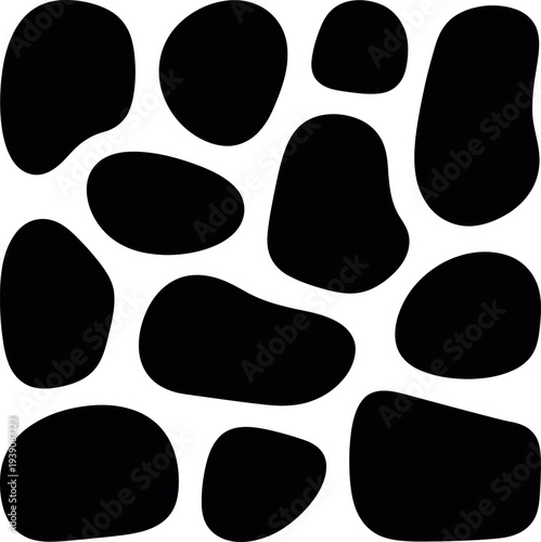 фотографія A minimalist illustration of black stones or pebbles on a white background