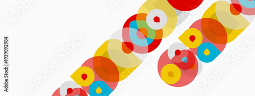 Colorful circles overlap diagonally across white background. Bright hues create playful, modern design. Simple shapes offer visual interest.