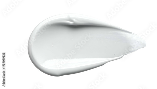 White cosmetic cream swatch, smooth texture, against a black background