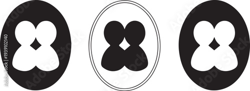 Three black and white oval shapes with symmetrical patterns