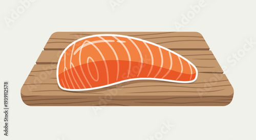 Salmon steak on wooden cutting board