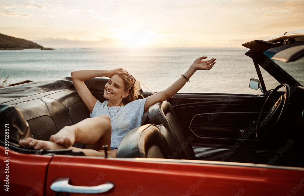 Fototapeta premium Road trip, rest or woman at beach with vehicle, outdoor destination or relaxing on tourist vacation. Travel, summer evening or person at ocean with car, weekend break or auto adventure in Australia.