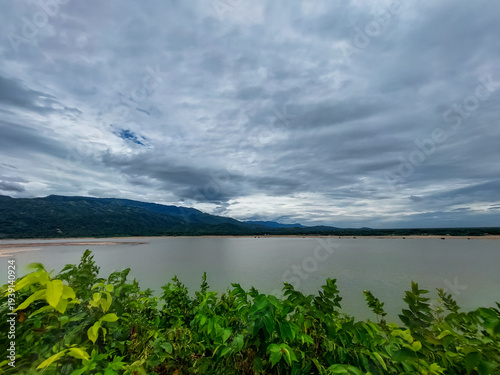 River with Mountains and Clouds