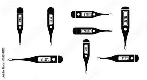Collection of digital thermometers displaying varying temperature readings