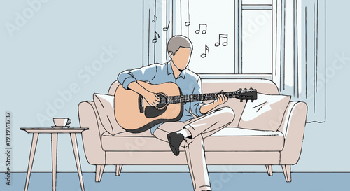 Man Playing Acoustic Guitar on Sofa.