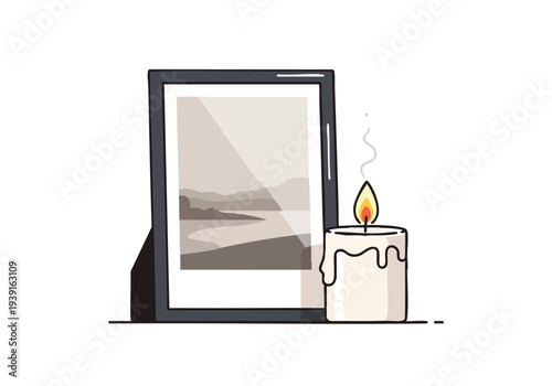 A framed photograph stands beside a lit candle, casting a soft glow on a serene landscape depicted within the frame, evoking a sense of nostalgia and remembrance